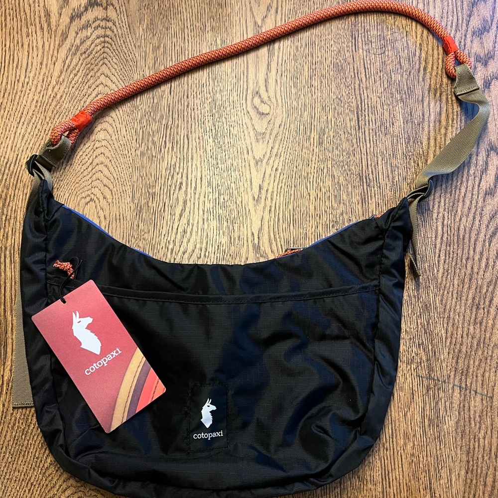 Cotopaxi Black and Red Bag